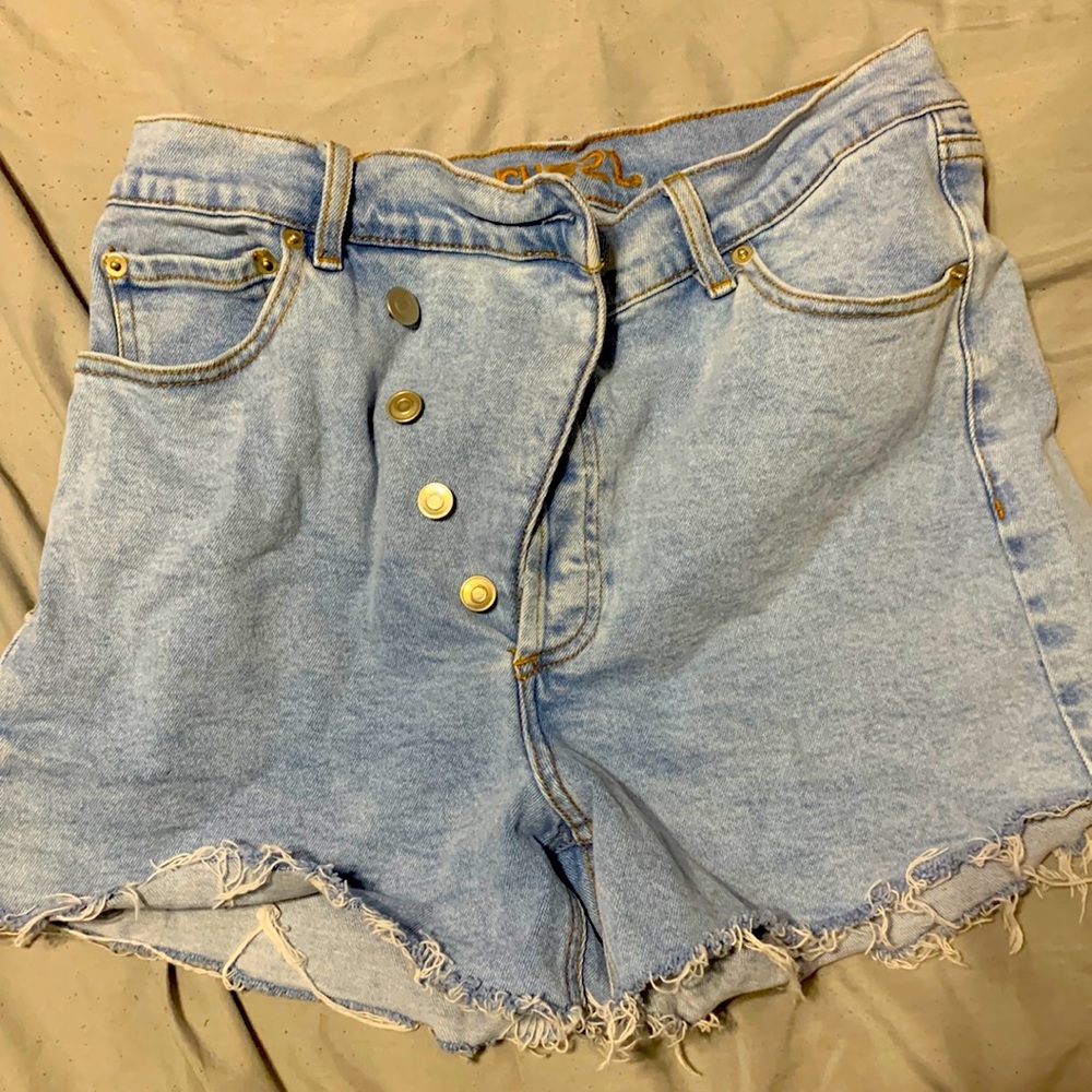 I am selling these boyfriend high wasted shorts that are light blue color.